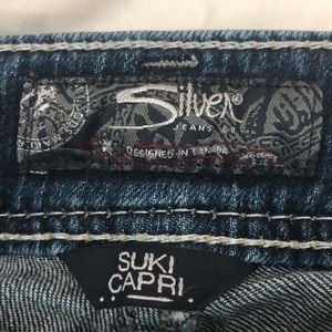 Silver Suzuki Capri jeans size 31